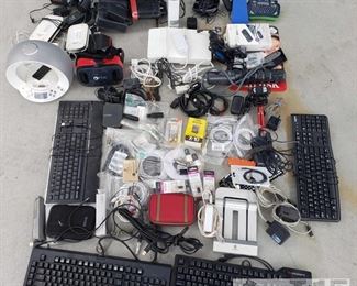 902: 	
Various electronics, cords, modems, and more
Various electronics, cords, modems, and more