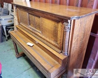 1405:  	
Antique Story & Clark Upright Player Piano
Antique Story & Clark Upright Player Piano. Serial No. 62098. Top lids latches are broken. Electronic components throughout piano. Sits on wheels.