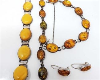 1540: 	
3 Sterling Silver Bracelets and 1 Pair of Earrings, Combined 52.6 Grams
3 Sterling Silver Bracelets and 1 Pair of Earrings