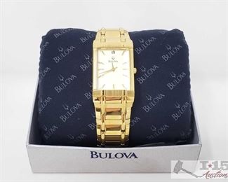 1150: 	
Men's Gold Toned Bulova Watch in Box, in Working Condition
Model Number C937382