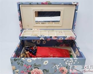1581: 	
Floral Jewlery Box with Assorted Costume Jewlery
Jewlery Box measures approx 13" x 8" 5"