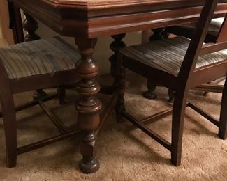 Grunbaum’s antique wood dining table w/chairs