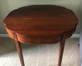 coffee table with fluted edging is not so prim after all