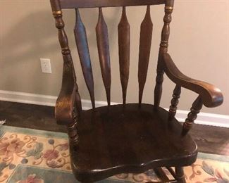 Antique rocking chair wants to sing you lullabies. 