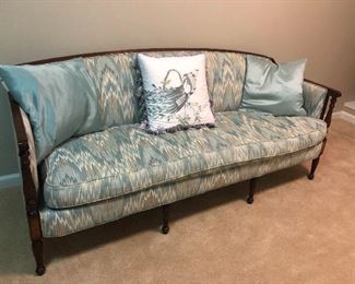 Lovely provincial sofa upholstered in fabric designed by Timothy Leary