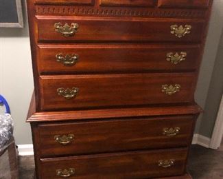 Highboy dresser with so many brass nipples it would be considered a witch by Witchfinder Sergeant Shadwell on Good Omens I LOVE THAT SHOW!!