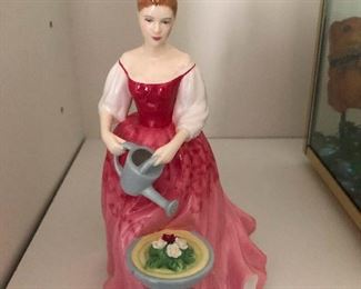 Ceramic maiden watering her big bowl of seaweed salad