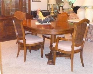 A BETTER PICTURE OF THE DINING TABLE AND CHAIRS. THIS SET HAS A TABLE,4 CHAIRS,CHINA CABINET, SERVER, LEAF AND PADS