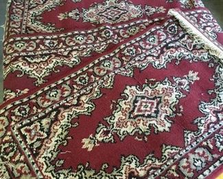 Various sized throw rugs