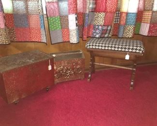 Brass covered wooden box on wheels, brass covered magazine rack, houndstooth covered piano bench with storage, quilt curtains