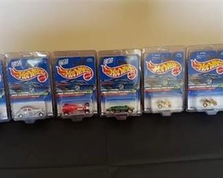 Lot of (9) 2000 Hot Wheels Treasure Hunts in Protector Paks