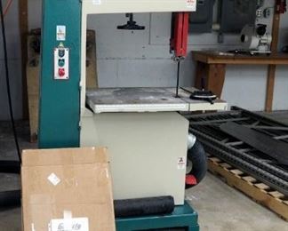 Grizzly Industrial Bandsaw Model #G0568 Includes Instruction Manual, Saw Keys, Rolling Platform, Additional Saw Blades And Belts, 220 Volt, Powers On