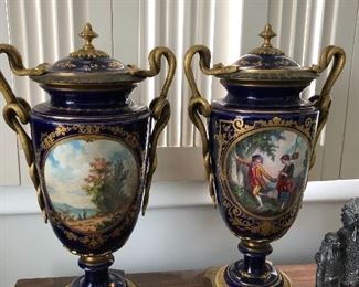 Sevres urns with serpent handles in excellent condition w/ lids