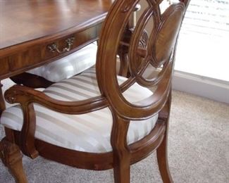 Benchmark dining room table with 2 leaves and 6 chairs. Matching china cabinet.