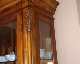 Benchmark lighted china cabinet. Matching dining room table and chairs.