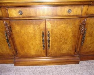 Benchmark lighted china cabinet. Matching dining room table and chairs.