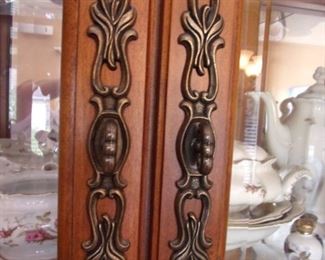 Benchmark lighted china cabinet. Matching dining room table and chairs.