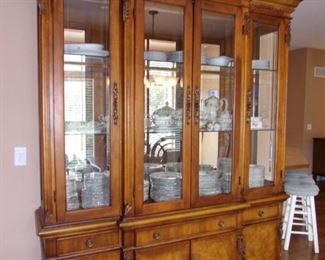 Benchmark lighted china cabinet. Matching dining room table and chairs.