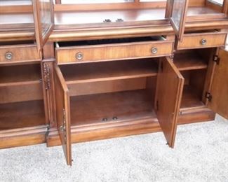 Benchmark lighted china cabinet. Matching dining room table and chairs.