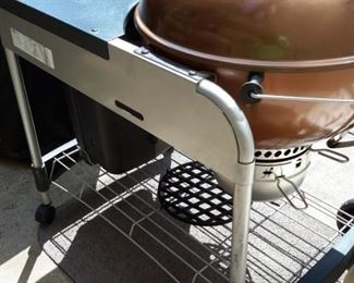 Weber 15502001 Performer Deluxe Charcoal Grill, 22-Inch, Copper -22-inch diameter porcelain-enameled bowl and lid with a cooking area of 363 square inch
Electronic Touch-N-Go gas ignition system
Aluminized steel One-Touch cleaning system with removable, high-capacity, aluminum ash catcher
Removable LCD cook timer and built-in lid thermometer
Assembled dimensions are 43.5-inch by 48-inch by 30-inch.Tuck-Away lid holder & Cover. New with cover on Amazon $450.......OUR PRICE $150