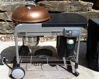 Weber 15502001 Performer Deluxe Charcoal Grill, 22-Inch, Copper -22-inch diameter porcelain-enameled bowl and lid with a cooking area of 363 square inch
Electronic Touch-N-Go gas ignition system
Aluminized steel One-Touch cleaning system with removable, high-capacity, aluminum ash catcher
Removable LCD cook timer and built-in lid thermometer
Assembled dimensions are 43.5-inch by 48-inch by 30-inch.Tuck-Away lid holder & Cover. New with cover on Amazon $450.......OUR PRICE $150