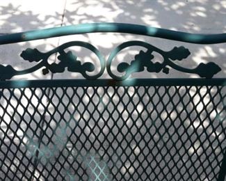 Wrought iron green patio table and four spring action chairs!