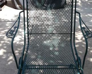 Wrought iron green patio table and four spring action chairs!