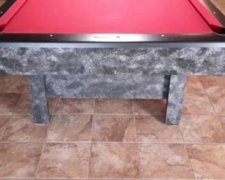 Contender by Brunswick in Graphite laminate/wood/metal with red felt includes pool table accessories such as cues.