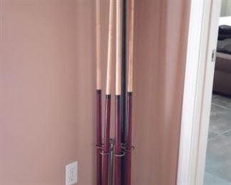 Contender by Brunswick in Graphite laminate/wood/metal with red felt includes pool table accessories such as cues.