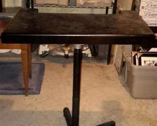 Adjustable height, moveable desk/writing platform desk.