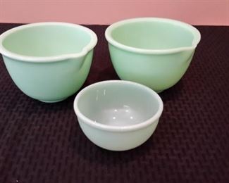 Vintage jadite small bowl and two vintage green milk glass electric mixer bowls.