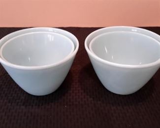 Two sets of vintage Fire King azurite nesting mixing bowls.
