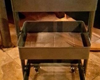 IKEA gray utility cart on casters.