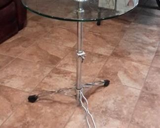 Unique glass table with drum stand legs...adjustable!