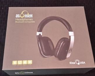 Atomick Headphones, like new, in box.