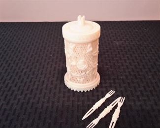 Vintage celluloid hour d'oeuvre pick holders.