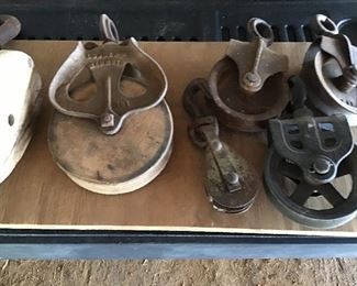 Metal and wooden pulleys