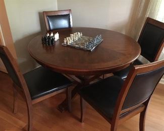 Round table with 4 chairs.  Perfect for game table!