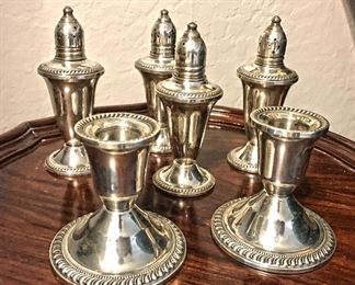 Weighted Sterling Silver candle stick holders ($28 for set) and salt and pepper shakers ($38 per set)