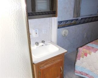 Separate sink, we really like this feature with it not being in the bathroom area.