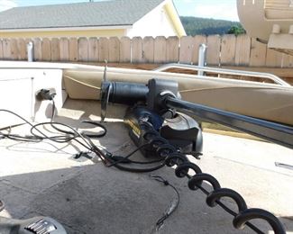 All setup for fishing, with bow seat, live fish wells and equipment. As well as fish finders, life jackets, oars and anchor.