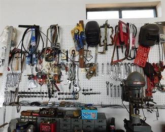One wall of small tools and misc