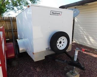Haulmark 5' x 7' enclosed trailer with spare tire with inside power source.