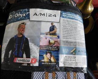 Automatic inflatable PFD by Onyx. Gas charged. Brand new.