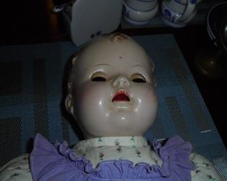 Antique doll w/closing eyes ( no marks)