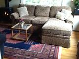 Norwalk Sectional with Chaise Lounge. Area Rug 6'5" X 9'10"