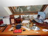Amoena, trinket boxes, costume jewelry, hair combs and barrettes, fans, perfume bottles, mirrored vanity trays and more.