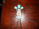Sterling Kachina Doll w/ Turquoise, Gold, Ruby, Emerald on a bolo.