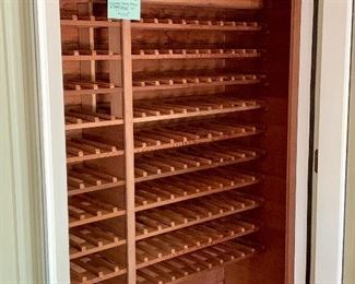 Wine closet with shelving, doors & Breezeair unit