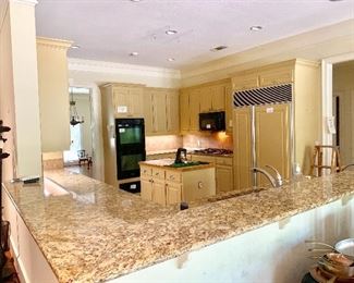 Full kitchen features 48" Sub Zero refrigerator, double ovens, warming drawer, gas cooktop, dishwasher, sink, faucet, cabinets & granite!!!